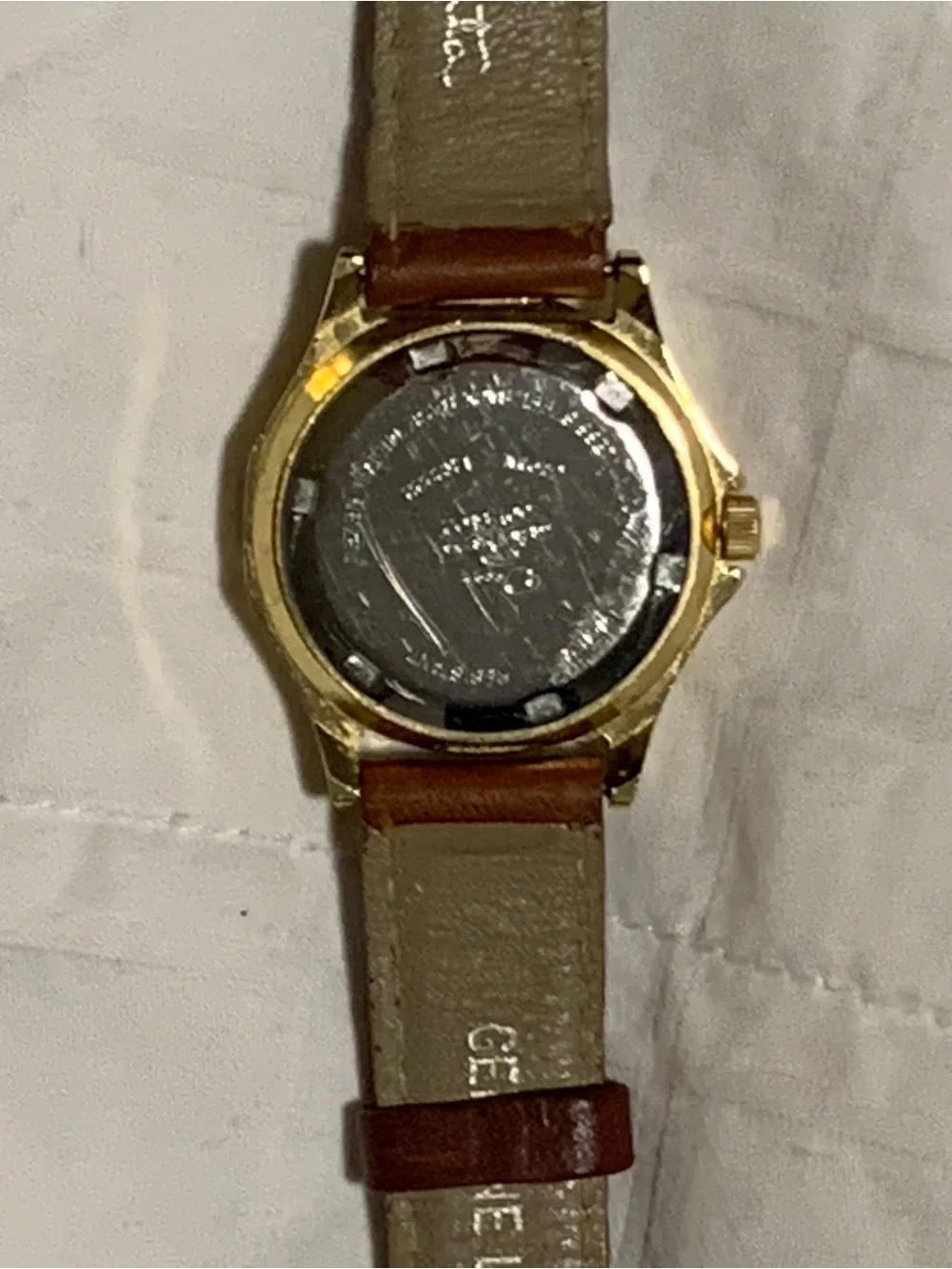 Vintage Oscar de la Renta Gold-Tone Watch with Black Bezel and Leather Strap